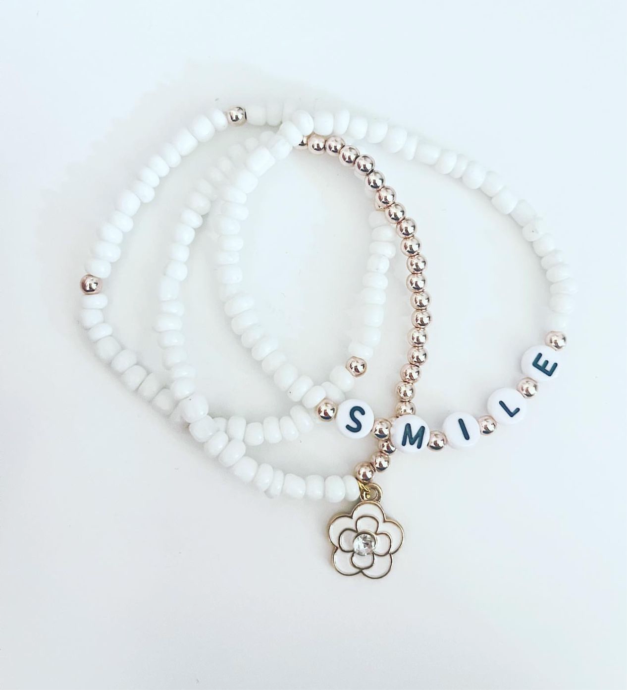 White & Gold Bracelets