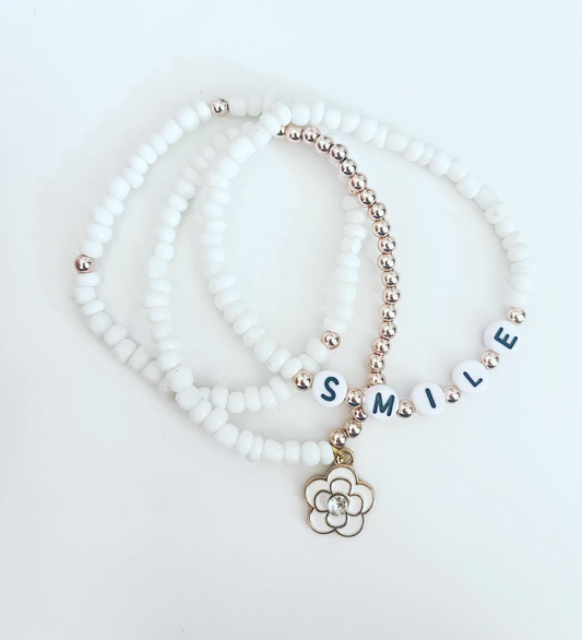 White & Gold Bracelets